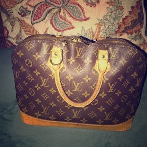 Authentic LouisVuitton “Alma” previously loved!
